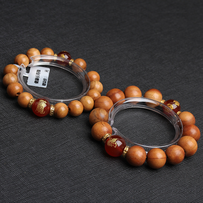 PULSERA DE CUENTAS DE MADERA DE DURAZNO