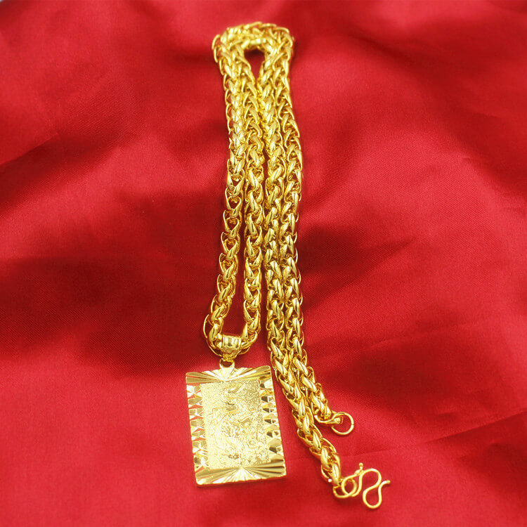 COLLAR CON ESTILO  DE DRAGON CHAPADO EN ORO